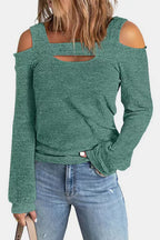 Women's elegant cold shoulder blouse by Trendsi, featuring a chic cutout design and casual polyester fabric.