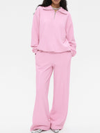 Women's quarter zip long sleeve loungewear set from Trendsi, stylish two-piece tracksuit with comfortable fit and modern design.