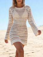 Women's long sleeve crochet knit beach cover-up dress by Trendsi, featuring boho style and lightweight, breathable fabric for swimwear cover.
