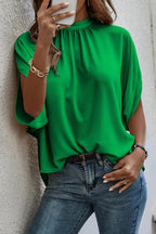 Plush Fashion Hub elegant tie-back half-sleeve blouse with side slit, stylish tops for casual or dressy occasions.
