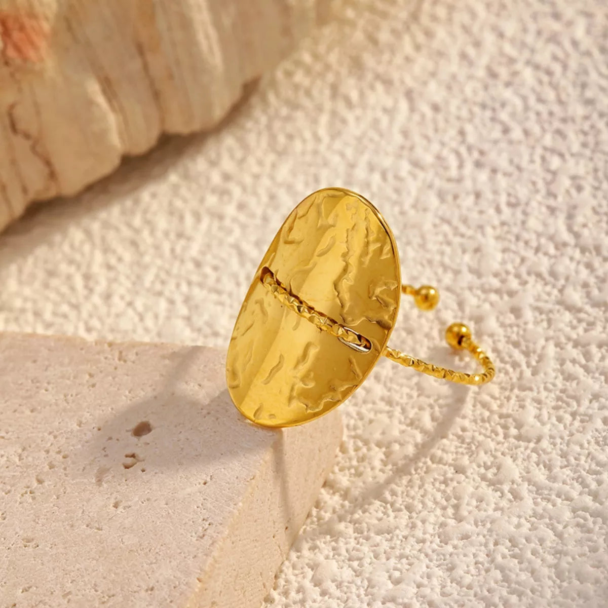 Hammered disc open ring from Plush Fashion Hub featuring a textured metal design and adjustable open band style.