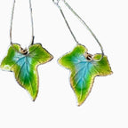 Shopimist alloy leaf drop earrings featuring elegant, lightweight leaf-shaped designs hanging from hooks.