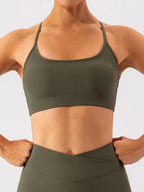 Trendsi spaghetti strap active bra in black, lightweight and stretchy, designed for comfortable workouts and active wear.