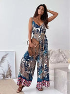 Printed spaghetti strap wide-leg jumpsuit by Shopimist, stylish and comfortable fashion jumpsuit with a colorful print and wide-leg design.