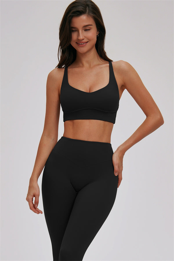 Fitglutes activewear cross back sports bra and leggings set, stylish gymwear designed for workout comfort and support.
