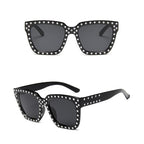 Women's sunglasses with crystal decorations, fashionable eyewear by FitiqueFit featuring stylish, transparent frames and tinted lenses.