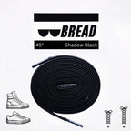 Black elastic shoelace from Plush Fashion Hub, shown in a classic style, suitable for comfortable, easy-to-wear sneakers.