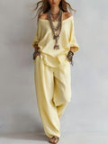 FitiqueFit chiffon puff-sleeve top and wide-leg pants set in a casualwear style, shown in a light pastel color.
