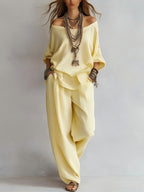 FitiqueFit chiffon puff-sleeve top and wide-leg pants set in a casualwear style, shown in a light pastel color.