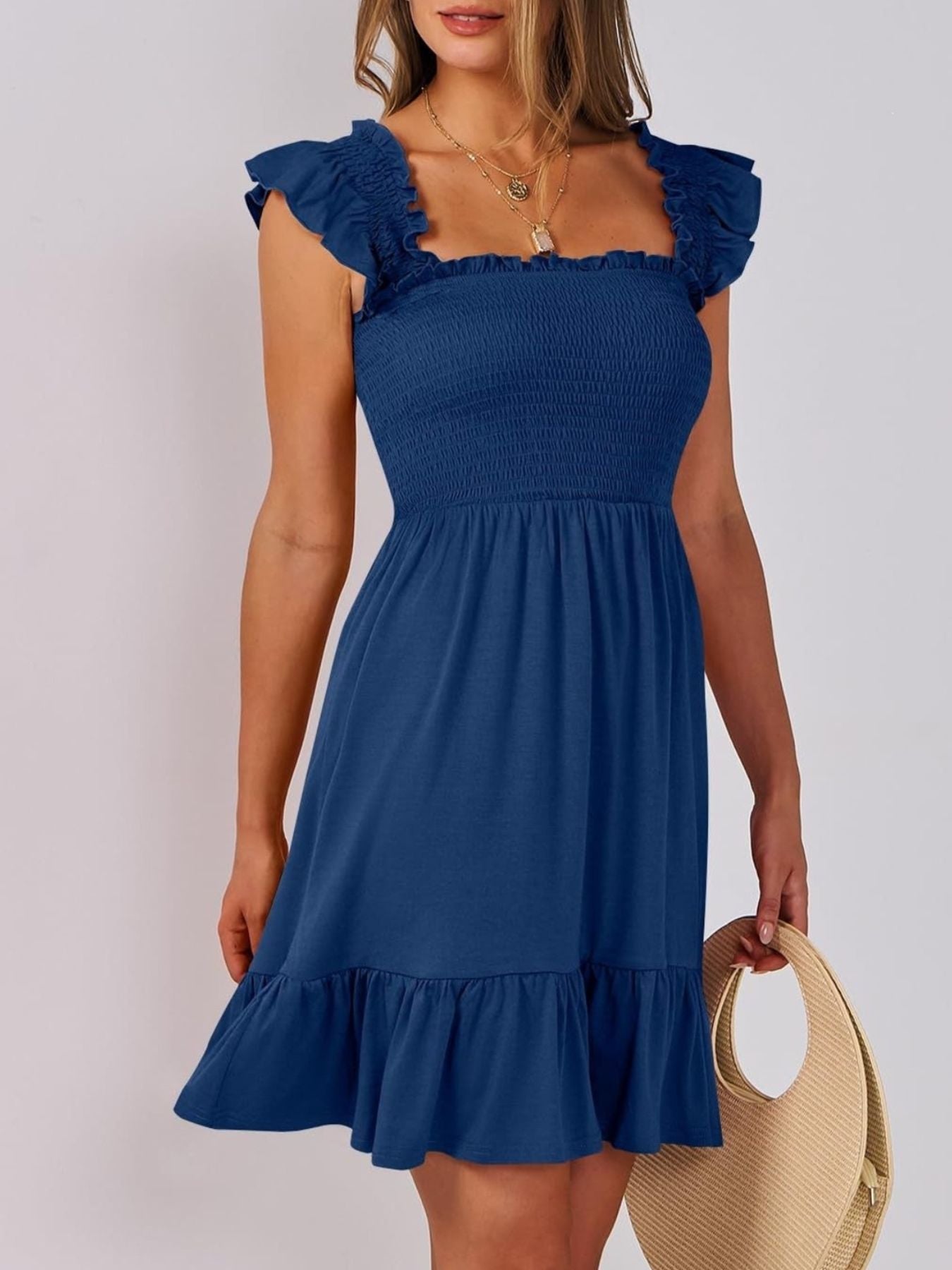 Women's smocked ruffle hem mini dress by Trendsi, casual lightweight summer dress with a flowy silhouette and ruffle details.