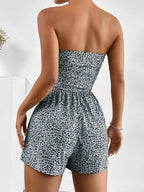 Chic strapless romper with ruched waist by Trendsi, featuring a stylish and fitted design perfect for warm weather.