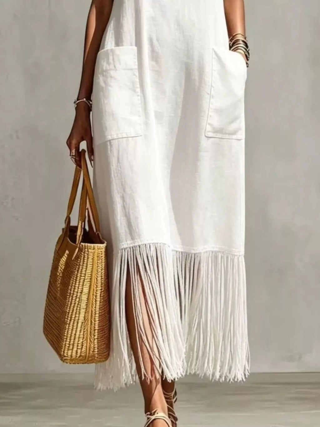 Plus size fringe V-neck spaghetti strap dress by Shopimist, full-length black dress with flowing fabric and stylish fringe detail.
