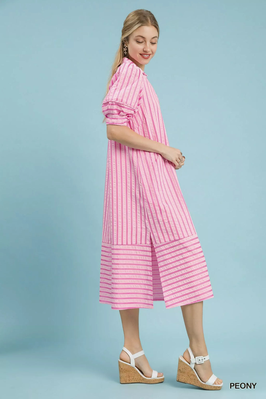 Umgee striped puff sleeve midi dress with a flowy silhouette, featuring bold vertical stripes and a fitted waist.