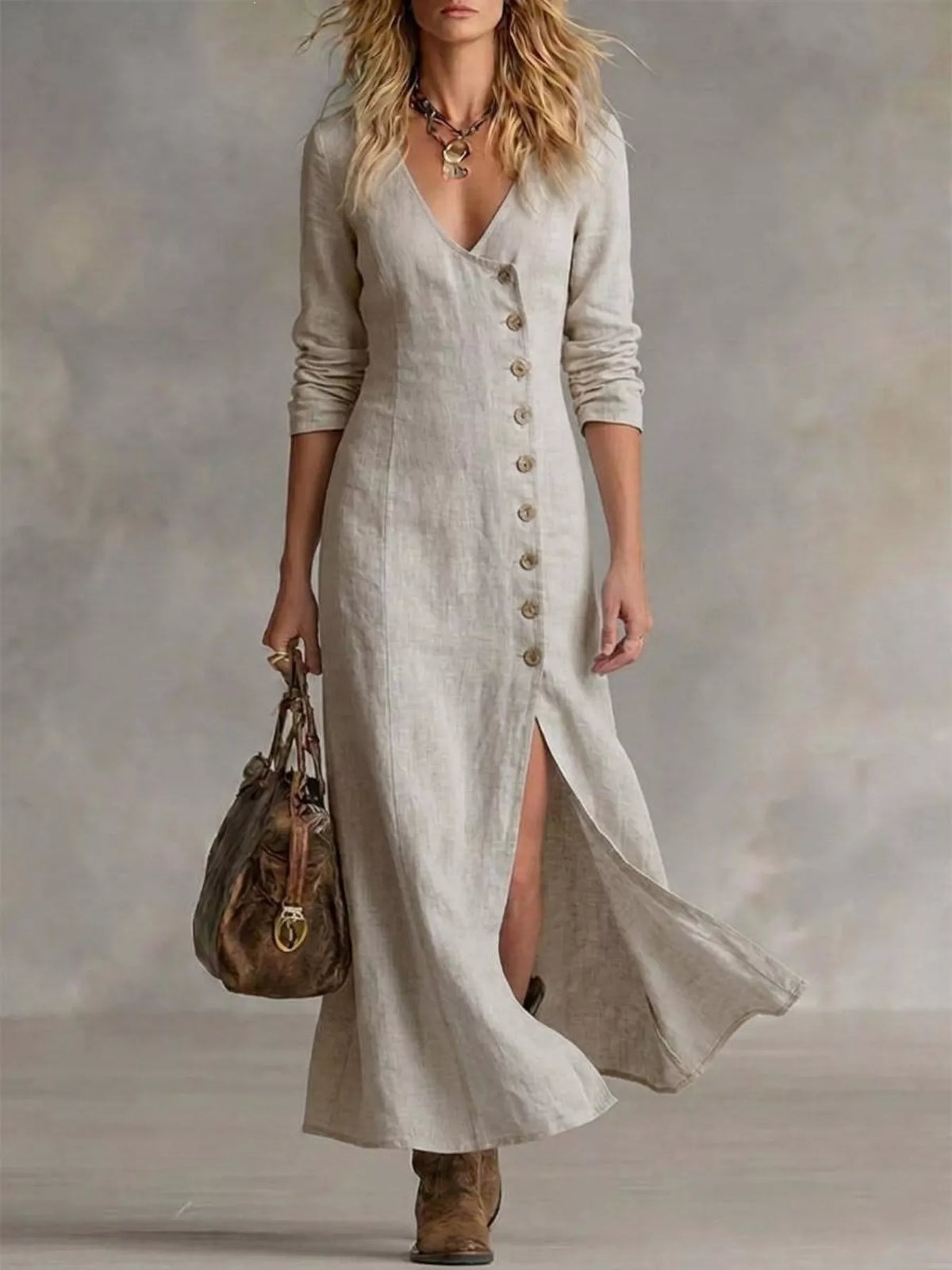 Plus size button-front maxi dress with front slit, plush fabric, and flowing design from Plush Fashion Hub.