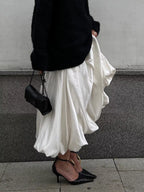 Flowy satin maxi skirt by Shopimist featuring a smooth, elegant fabric and a flowing silhouette, perfect for stylish everyday wear.