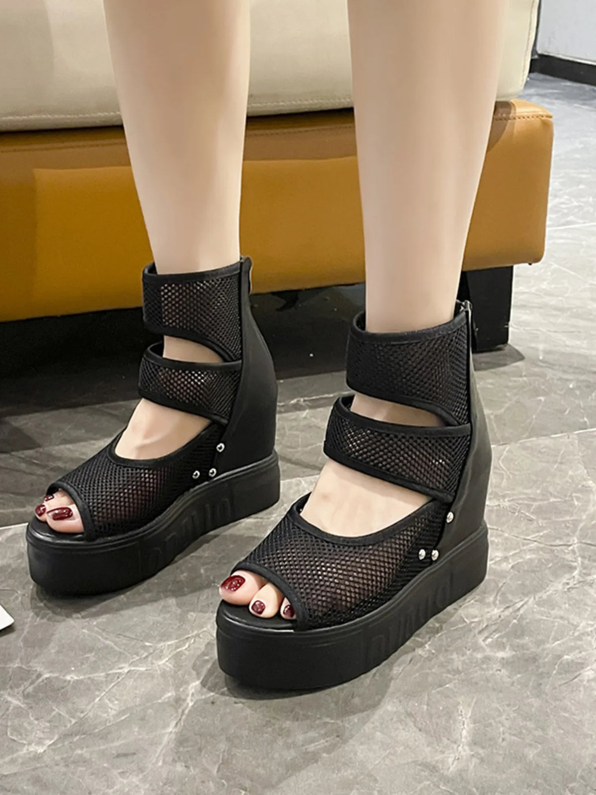 Trendsi mesh cutout platform sandal showing open-toe design, chunky heel, and stylish cutout details on black shoes.