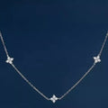 925 Sterling Silver Clover Charm Necklace with delicate pendant, showcasing a nature-inspired jewelry piece from Shopimist.