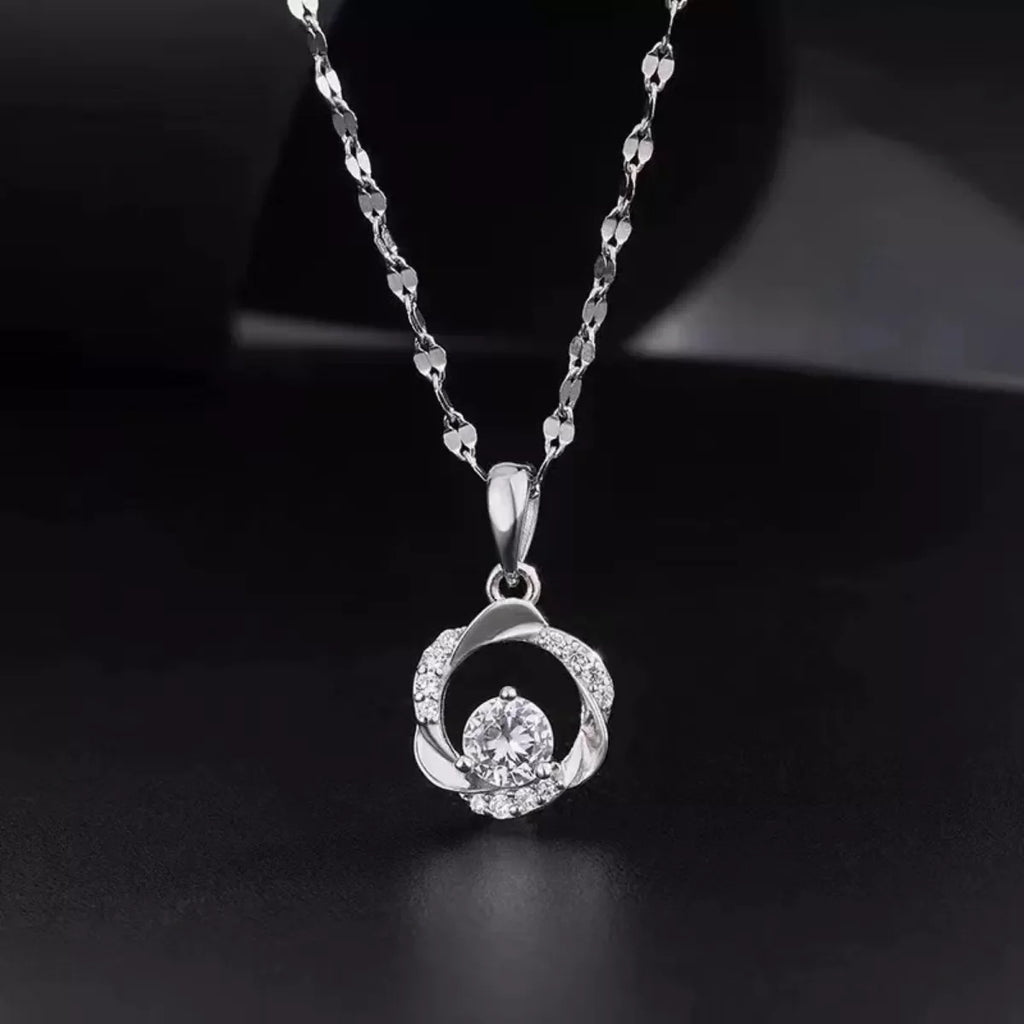 925 sterling silver zircon pendant necklace featuring a sparkling gemstone on a delicate chain, elegant jewelry accessory.