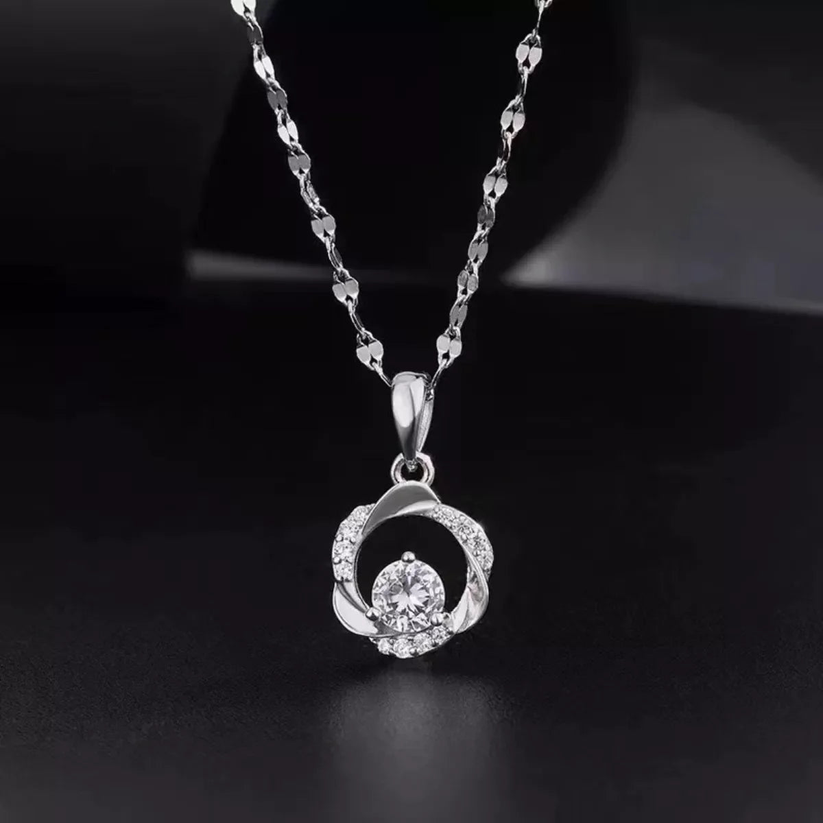 925 sterling silver zircon pendant necklace featuring a sparkling gemstone on a delicate chain, elegant jewelry accessory.