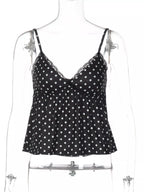Polka dot lace trim cami top from Shopimist featuring delicate lace details and a stylish polka dot pattern.