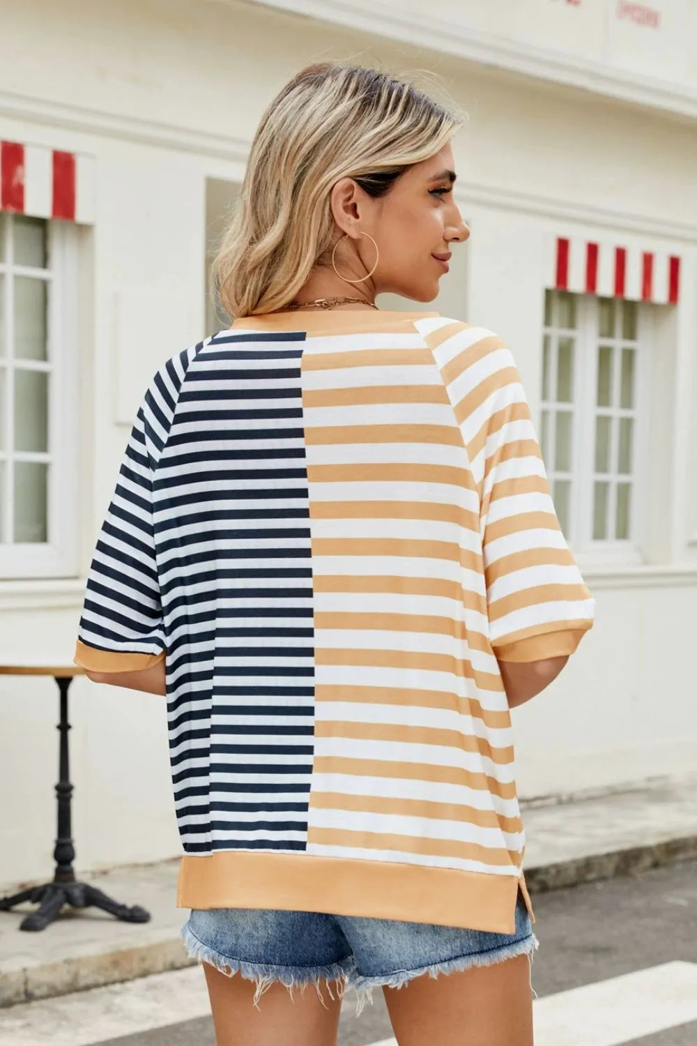 Striped round neck half sleeve T-shirt from Trendsi featuring horizontal stripes and a casual fit, displayed on a white background.