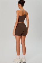 Fitglutes activewear one-shoulder crop top and shorts 2-piece set, stylish gymwear and workout clothes for women.