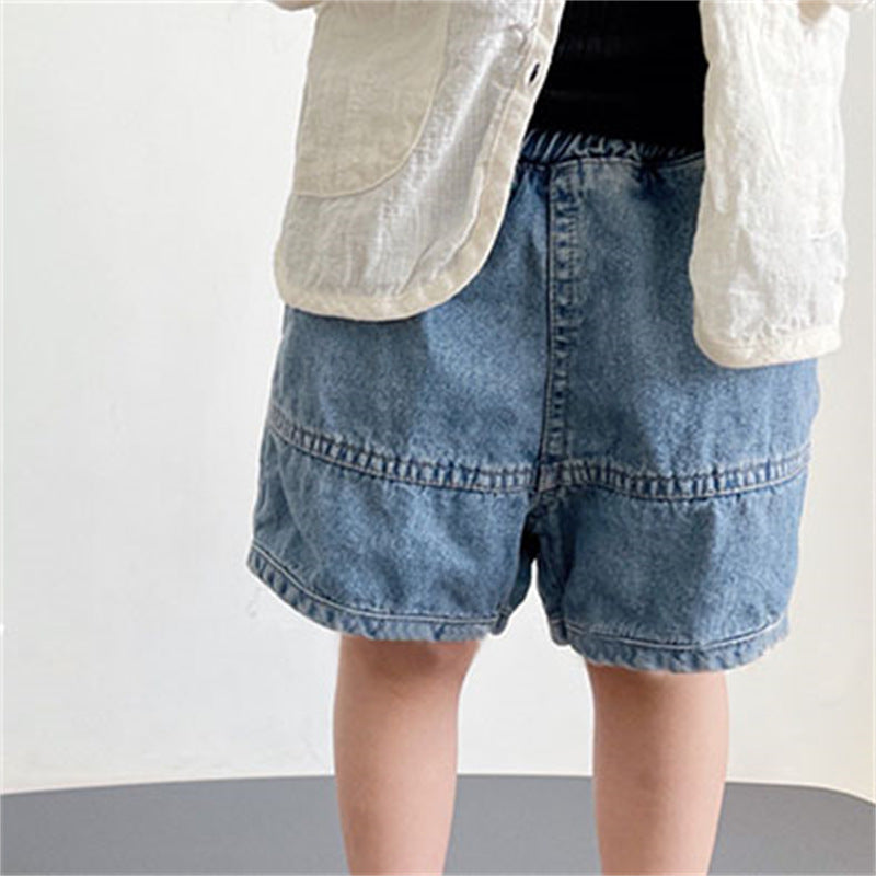 Blue denim shorts with an elastic waist and horizontal stitched seam detail across the legs.