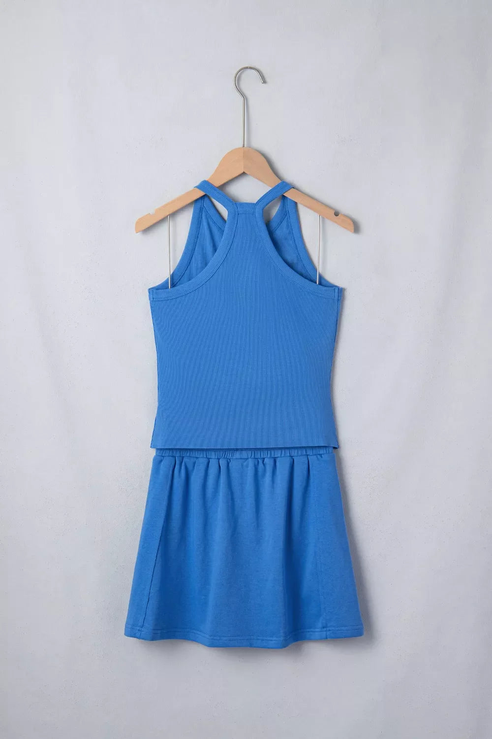 Sleeveless cropped top and pocketed skort set by Shopimist, stylish summer outfit with sleeveless design and functional pockets.
