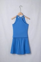 Sleeveless cropped top and pocketed skort set by Shopimist, stylish summer outfit with sleeveless design and functional pockets.