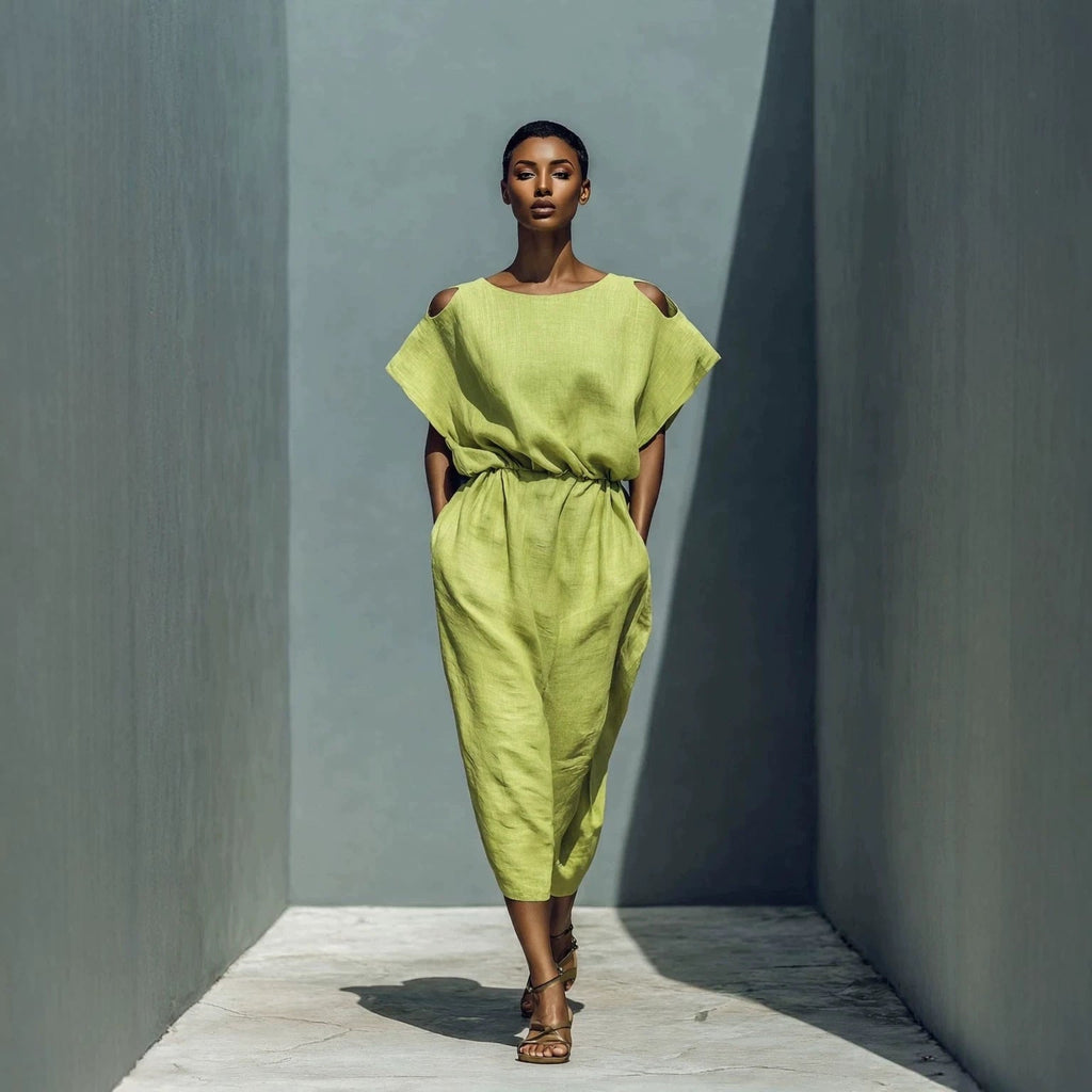 Women's FitiqueFit batwing sleeve off-shoulder maxi dress with elastic waist, flowing design and stylish silhouette.