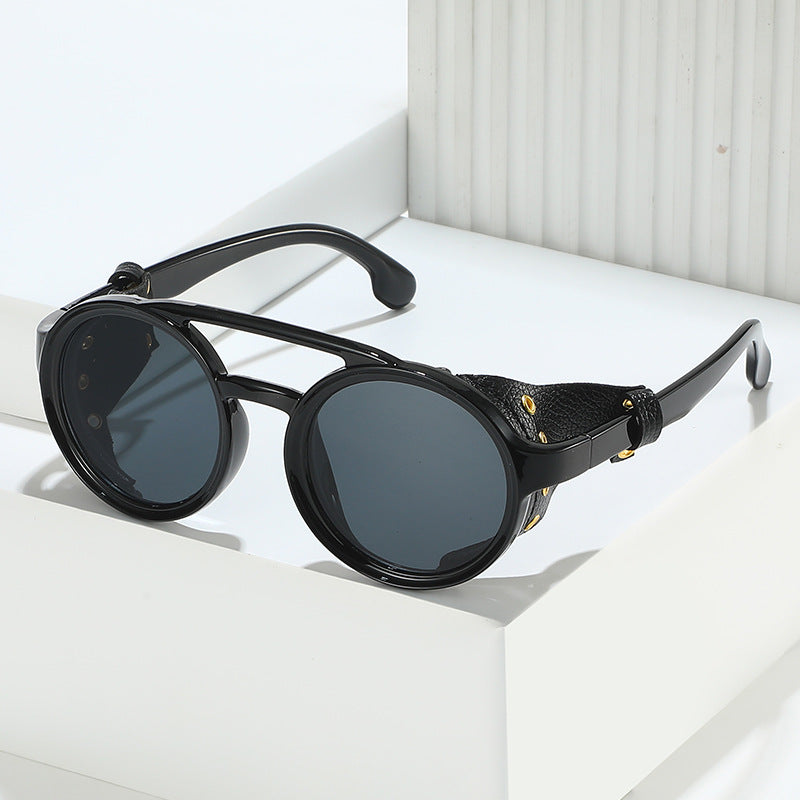 Retro round leather frame sunglasses from Plush Fashion Hub featuring vintage-style eyewear with dark lenses and classic leather detailing.