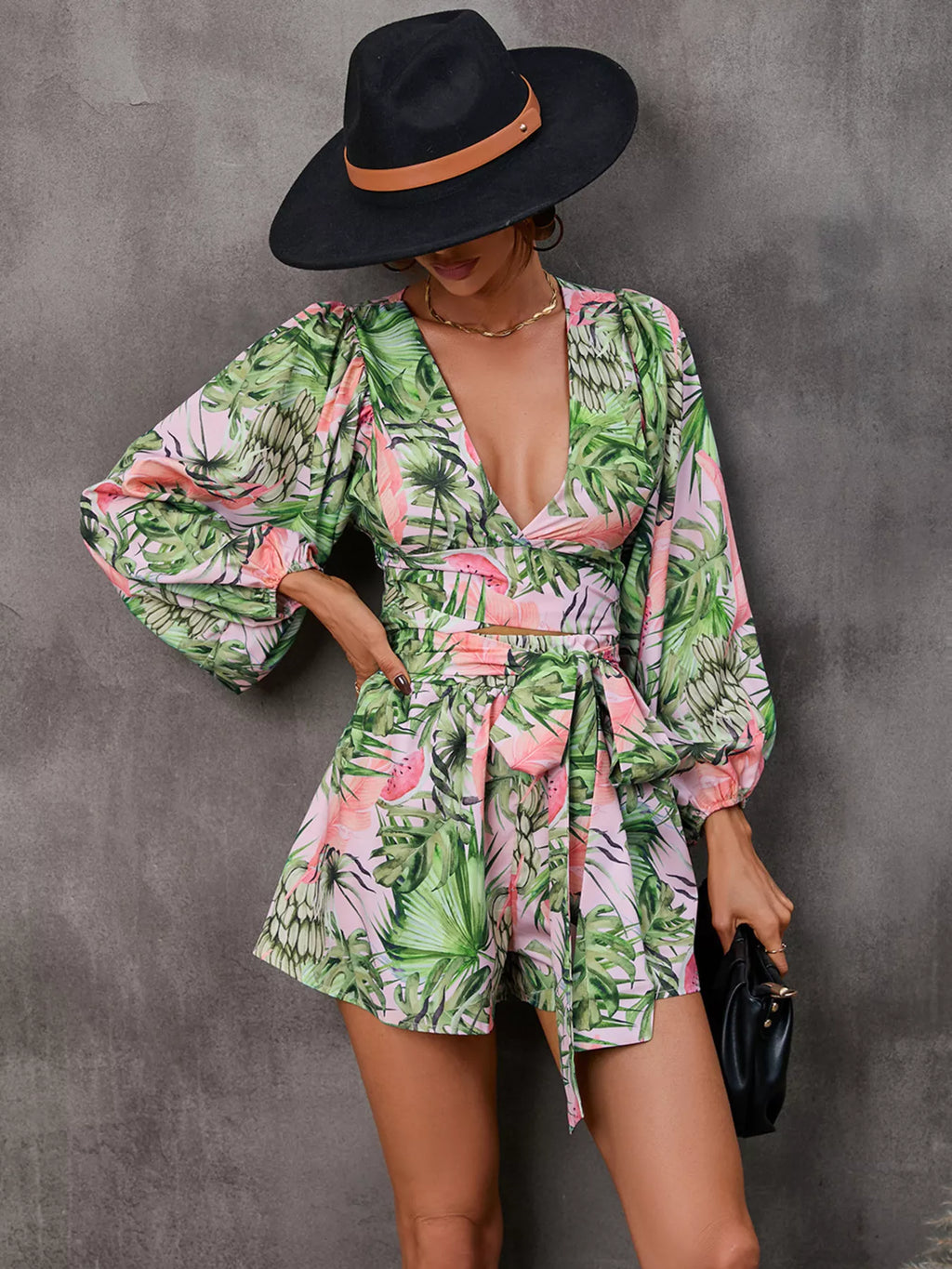 Shopimist cutout front printed long sleeve romper jumpsuit with bold graphic design and stylish fit.