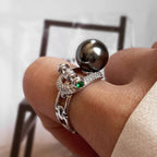 Sterling silver zircon pearl ring with intricate design, showcasing a shiny pearl and sparkling zircon stones on the band.
