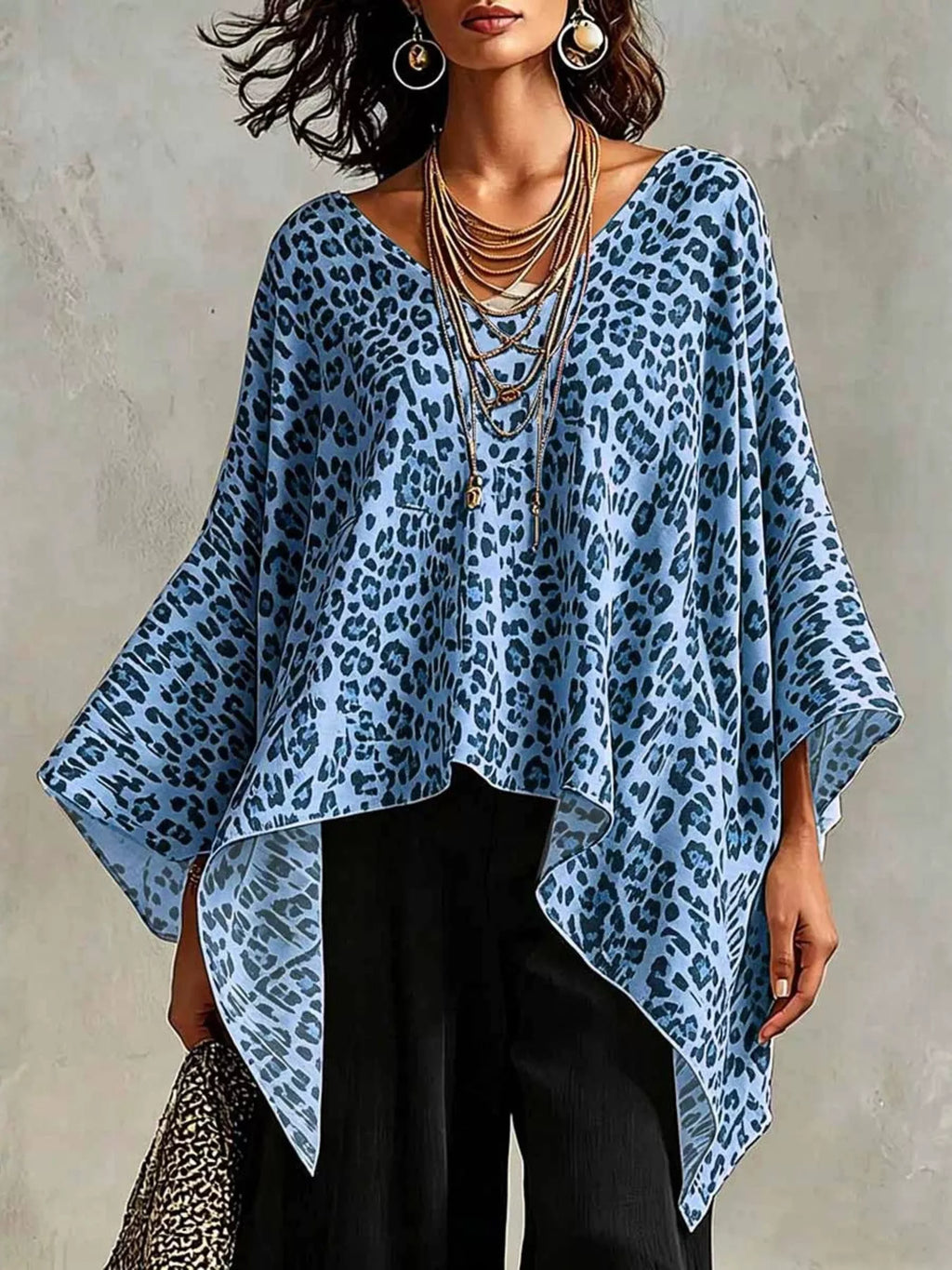 Plus size leopard print asymmetrical hem top from Trendsi, featuring a stylish and flowy design with bold animal print.