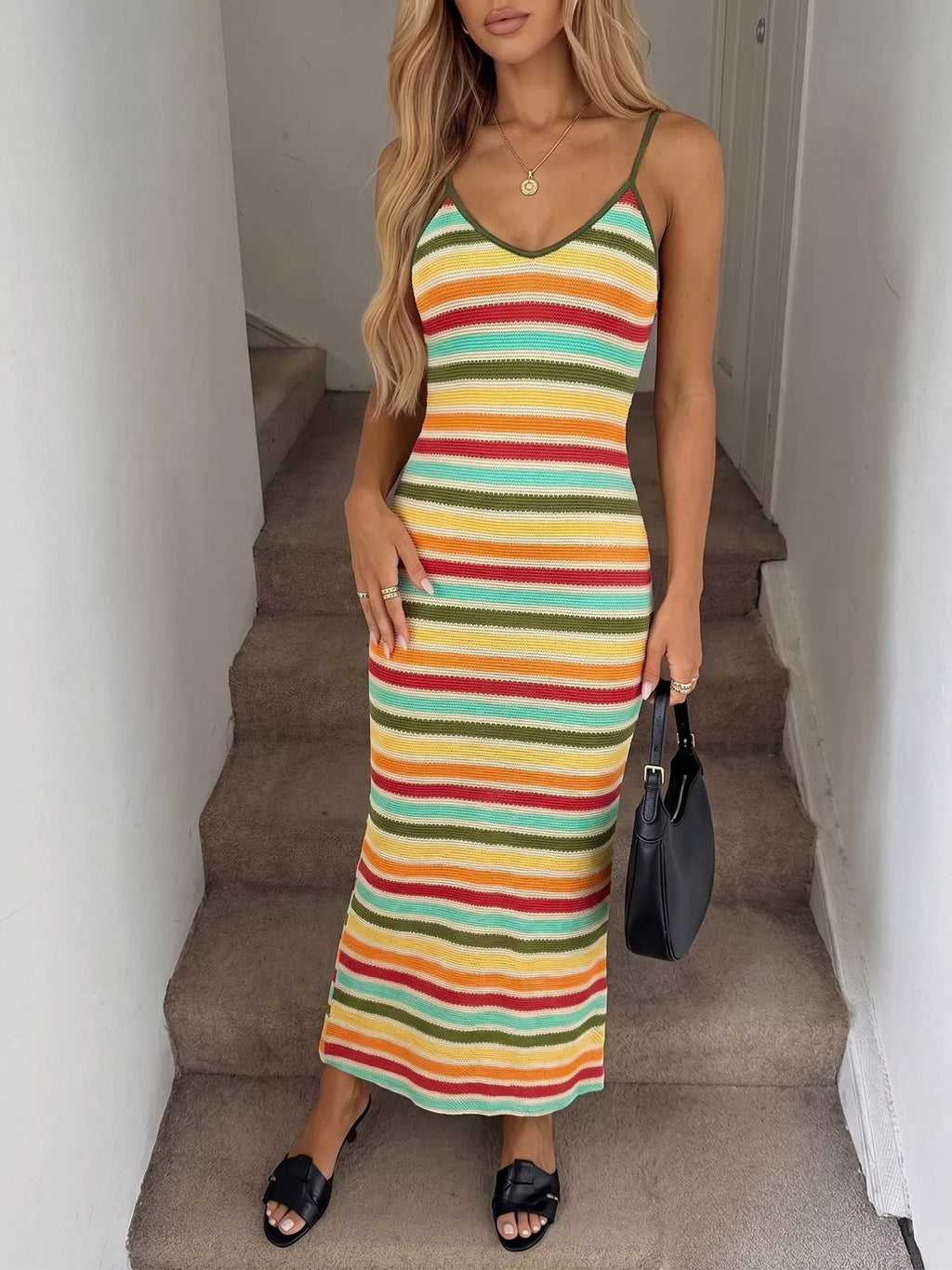 Striped bodycon knit midi dress from Trendsi featuring a fitted silhouette and stylish pattern, perfect for casual or dressy occasions.
