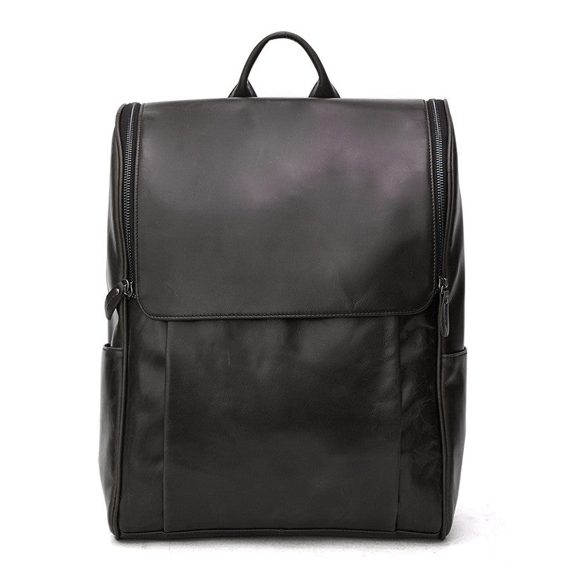 Black leather computer backpack from Plush Fashion Hub, featuring a sleek first layer leather design with multiple compartments.