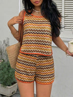Women's zigzag knit tank top and shorts two-piece lounge set by Trendsi, featuring a comfortable knit fabric and stylish pattern.