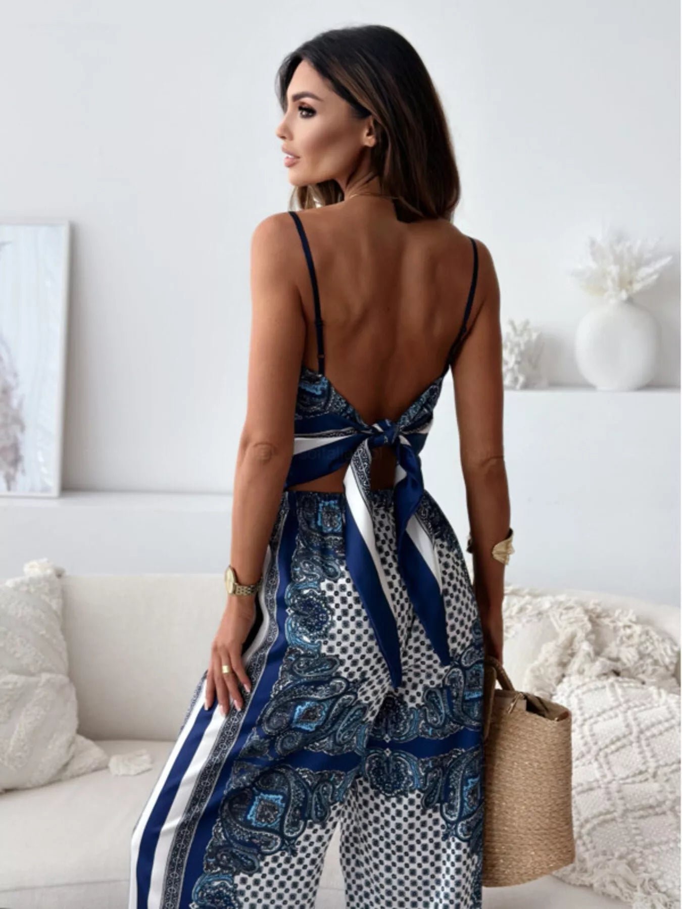 Printed cami and wide-leg pants set from Plush Fashion Hub, featuring a stylish matching top and flowy pants for a trendy look.