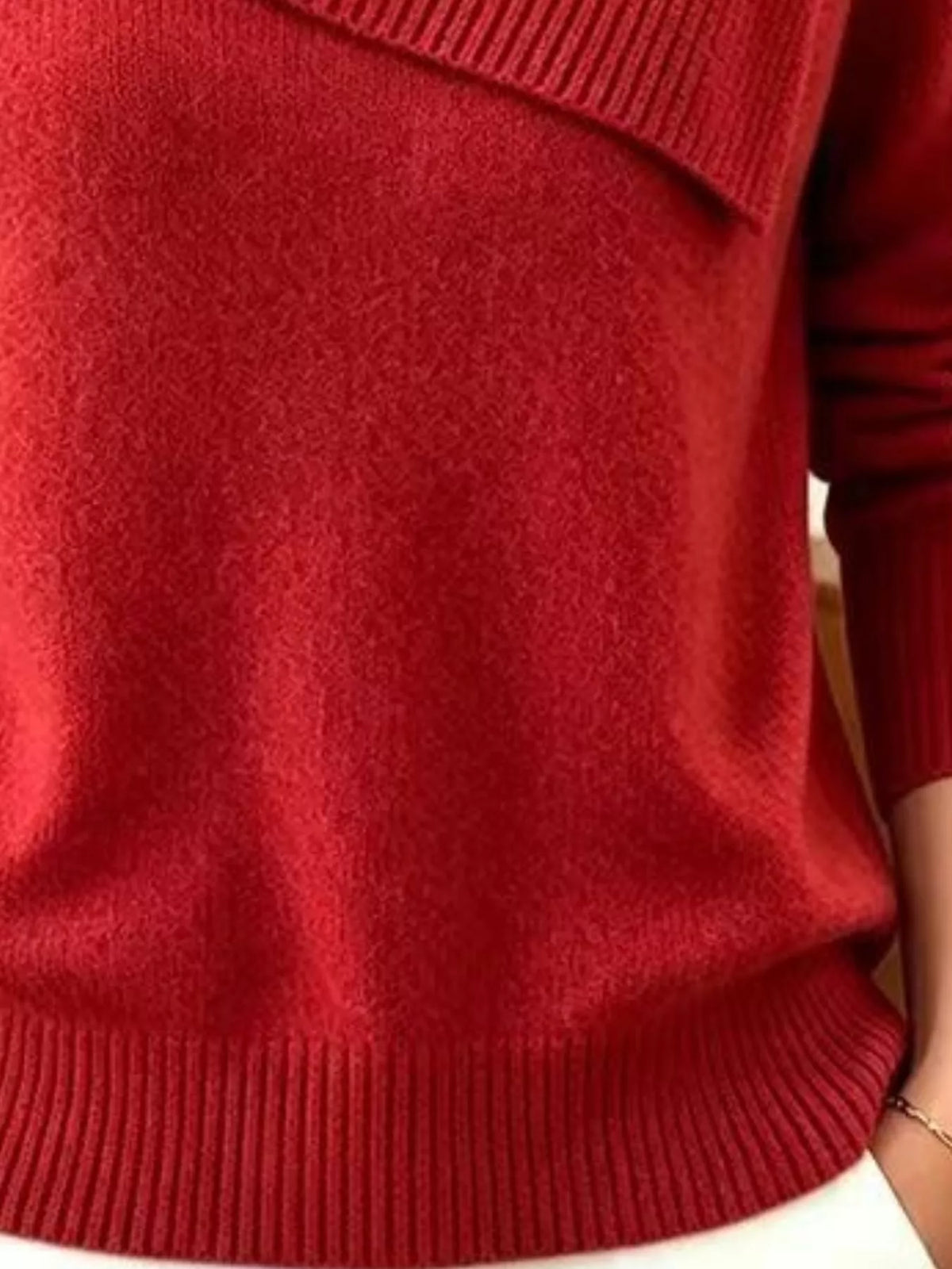 Plus size Trendsi ribbed collar sweater with an asymmetric design, featuring a cozy knit texture and full-length sleeves.