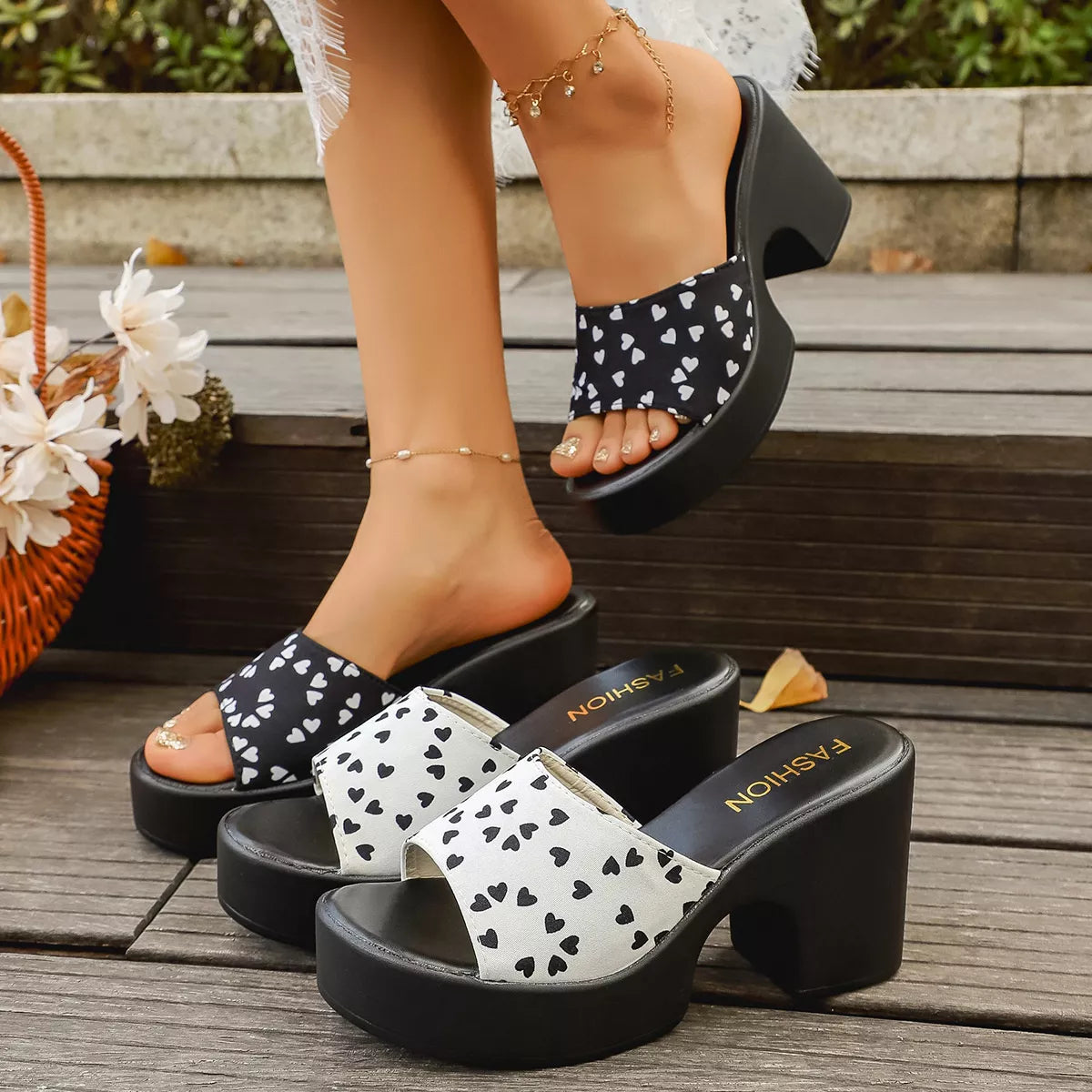 Plush Fashion Hub heart print block heel sandals with open toe design and stylish straps on a neutral background
