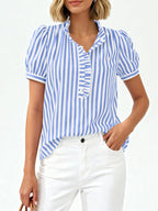Women's striped puff sleeve blouse with ruffled details, featuring a stylish and feminine design by Trendsi.