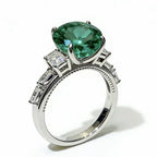 Sterling silver ring with an 8-carat moissanite gemstone, elegant jewelry piece with detailed band design.