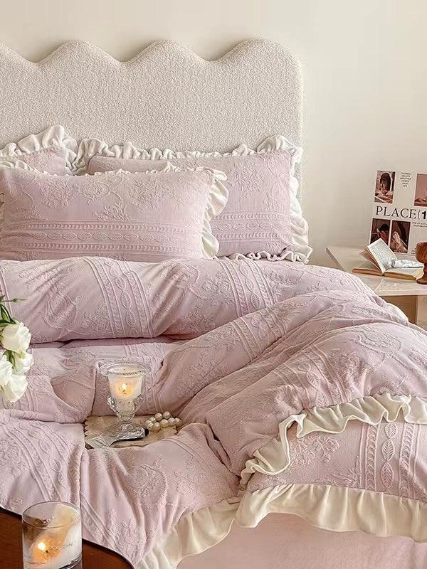 Set of four 3D printed coral fleece bed sets from Plush Fashion Hub, soft and cozy bedding in warm coral fleece fabric.
