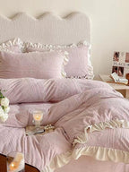 Set of four 3D printed coral fleece bed sets from Plush Fashion Hub, soft and cozy bedding in warm coral fleece fabric.