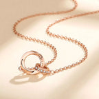 18K rose gold-plated sterling silver necklace with delicate chain and subtle shine, styled for elegant wear.