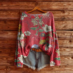 Women’s fall wildflower print long sleeve T-shirt by Plush Fashion Hub, casualwear with vibrant floral pattern and comfortable fit.
