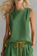Contrast trim sleeveless tank top and shorts loungewear set from Trendsi, casual sleepwear with comfortable fabric and stylish design.