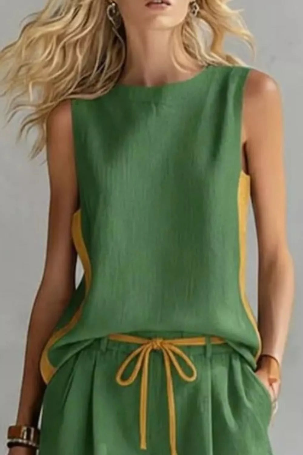 Contrast trim sleeveless tank top and shorts loungewear set from Trendsi, casual sleepwear with comfortable fabric and stylish design.