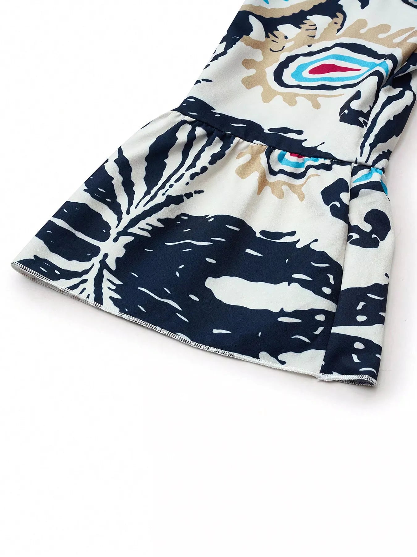Bohemian print tiered mini dress by Shopimist with vibrant patterns and flowing fabric, perfect for casual or summer wear.