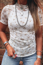 White floral lace fitted mock neck T-shirt with short sleeves from Trendsi, featuring intricate lace detailing and a sleek, feminine fit.